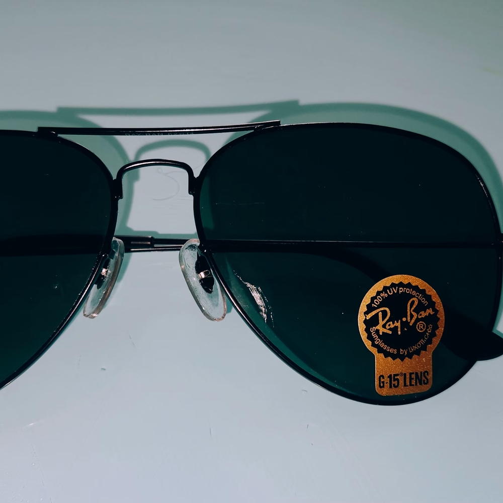 Ray-Ban Aviator Sunglasses with Dark Lenses